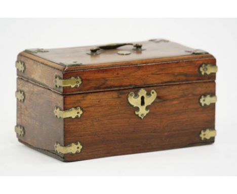 A 19th Century walnut and brass mounted tea caddy, having three interior canisters, the hinged lid fitted with a brass carryi