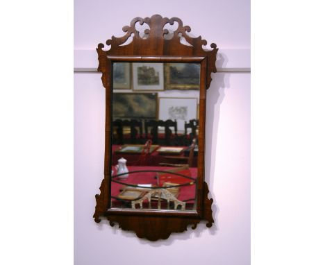 A mahogany Chippendale style wall mirror, with fretwork frame, 69cm x 36cm