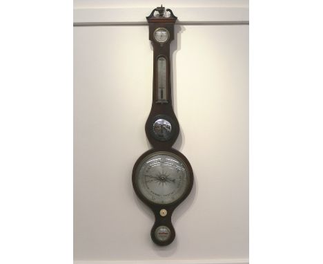 A 19th Century mahogany and boxwood strung banjo barometer, surmounted by a scroll arch pediment and central finial, silvered