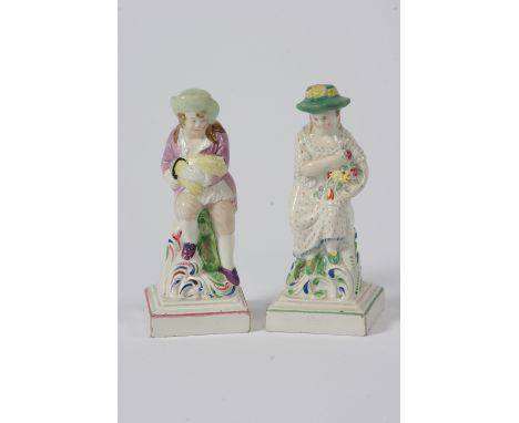 Two early 19th Century English pottery figures, of Spring and Summer, impress mark to the base, with letter 'G' surmounted by