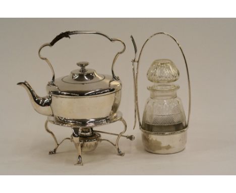 An Arts & Crafts style plated tea kettle, on spirit heater stand, 23.5cm high; and a cut glass pickle jar in plated stand wit