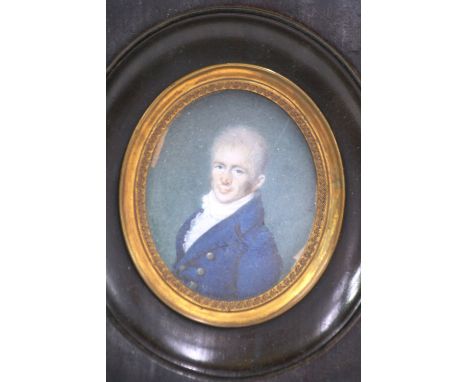 19th Century school, oval portrait miniature of a gentleman in blue coat, contained in a mahogany frame