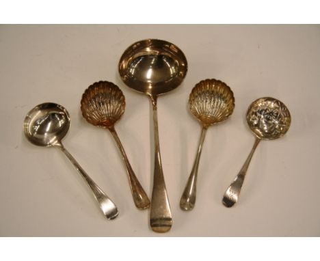 A Victorian silver soup ladle, London 1884; a pair of silver 'Old English' pattern sauce ladles with shell bowls, London 1879