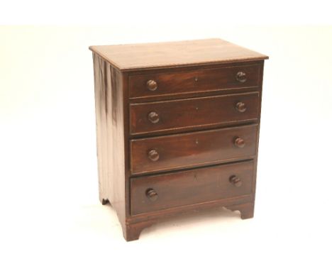 A 19th Century mahogany chest, of small proportions fitted four drawers, raised on bracket supports, 64.5cm wide x 45cm deep 