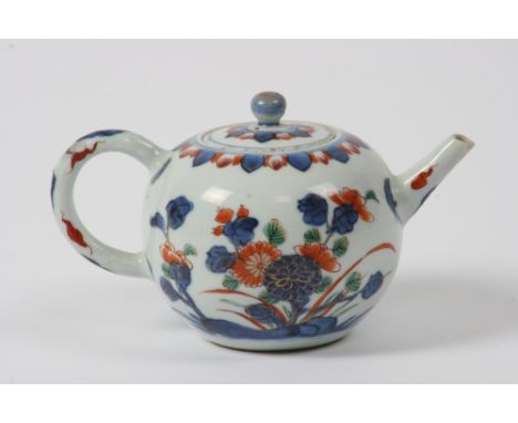 A 19th Century Chinese Imari pattern small teapot, 17cm long overall x 10cm high  - see illustration