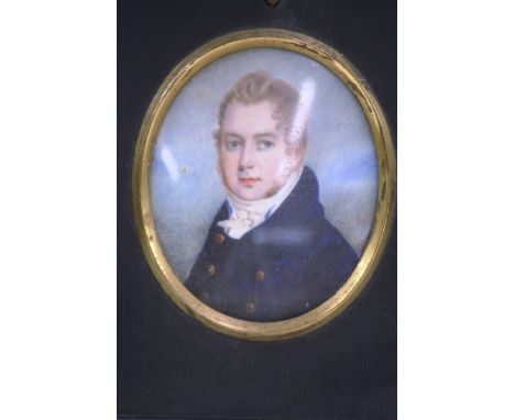 19th Century school, portrait study of a gentleman in blue coat, contained in an ebonised and acorn mounted frame