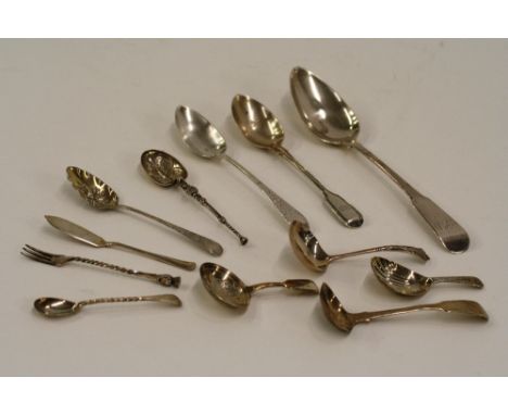 A large quantity of Georgian, Victorian and later silver teaspoons, caddy spoons, butter knives etc., 32ozs.