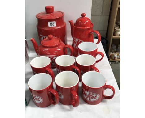 A quantity of Kit Kat advertising cups, tea pots and a cookie jar