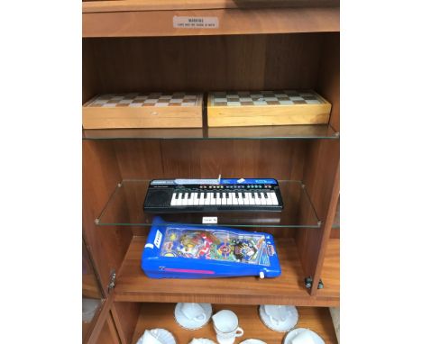A Tomy Sonic the Hedgehog pinball machine, 2 chess sets etc.