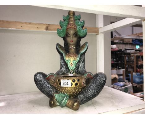 An oriental pottery figure table lamp