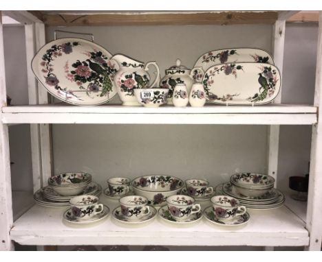 2 shelves of Myott Meakin Dynasty collection exotic garden dinnerware