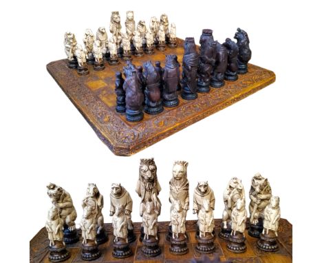 An oversized Reynard The Fox pattern resin chess set with chess board,&nbsp; the king measures 19cm, board measures 60cm x 60