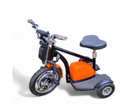 An electric three wheeler scooter, black and orange livery, untested