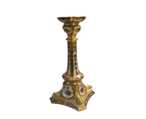 A Royal Crown Derby 1128 pattern Castleton candlestick, outswept square base with dolphins to angles, 26.5cm high, printed ma