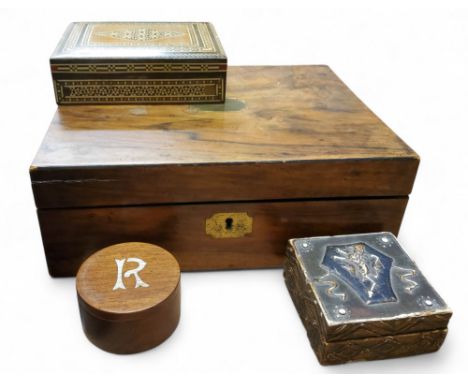 A Victorian rosewood work box, brass shield cartouche and escutcheon, 30cm wide, c.1870;&nbsp; &nbsp;others boxes