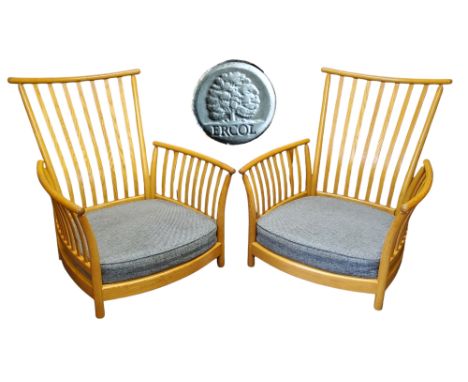 A pair of blonde Ercol Renaissance armchairs (with cushion templates)