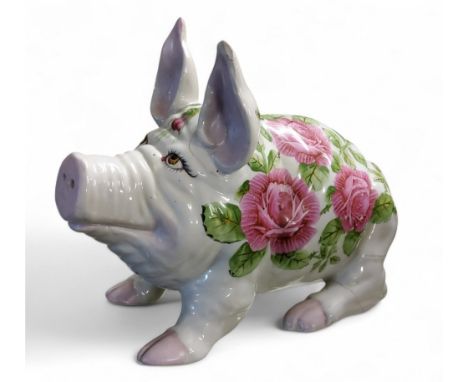 A Wemyss Ware type&nbsp; pig, decorated with large cabbage rorse, 26cm high