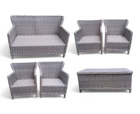 A modern rattan garden furniture set by 'Supremo Leisure' including a two seater sofa, four armchairs and coffee table