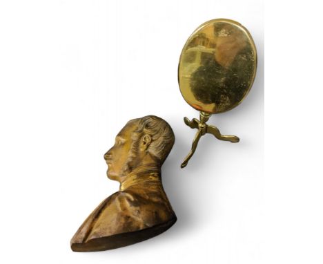 A 19th century brass bust, of a gentleman, side profile, 20cm high;&nbsp; &nbsp;&nbsp;a 19th century brass miniature tripod o