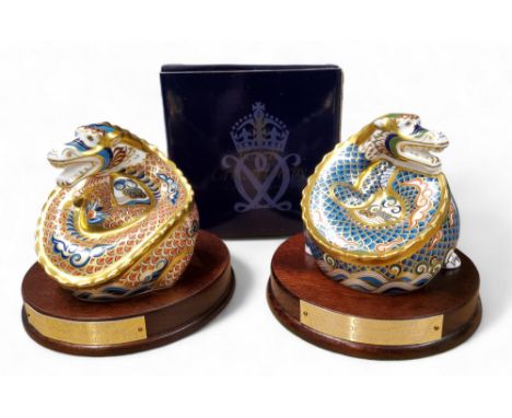 A pair of Royal Crown Derby Millennium Dragon paperweights, Dragon of Good Fortune and Dragon of Happiness, exclusives to Pet