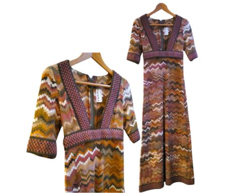 A Jean Varon wool prairie style full length dress, labelled, size 12,&nbsp; v shape cut away panel, Aztec style woven fabric,