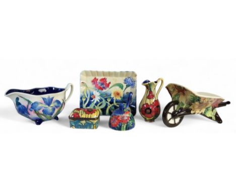 An Old Tupton Ware wheel barrow, tube lined with stylised flowers, printed mark, boxed;&nbsp; a similar mustard, trinket box,