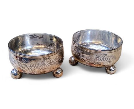 A pair of Victorian salt cellars, hallmarked H&amp;T possibly Hammond and Turner, 1879, 102g