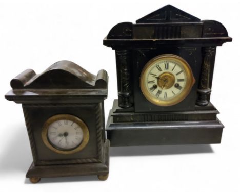 A 19th century German mantel clock. in faux slate, Roman numerals, twin winding holes, 14 day strike, c.1880;&nbsp; &nbsp;ano