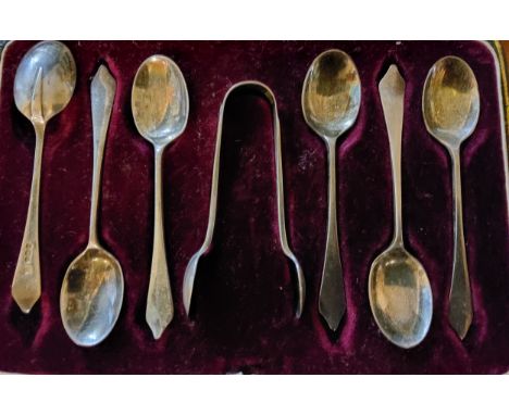 A set of six silver Rattail coffee spoons, bows ensuite, Sheffield 1928, cased