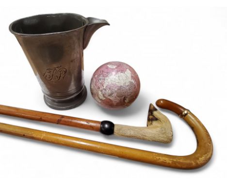 A 20th century pewter quart mug, with spout, marked ER 522 LCC, the inscribed Cardinal Woolsey, 16cm high;&nbsp; &nbsp;a 20th