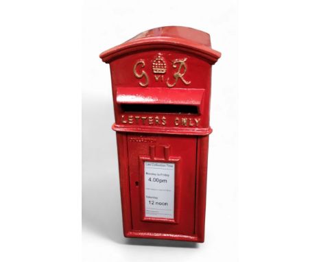 A replica GVIR Post Office post box, painted in red, 58cm high, 28cm wide, 37.5cm deep