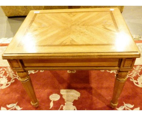 OAK SIDE TABLE. Light oak side table with octagonal legs and quatrofoil inlaid top 