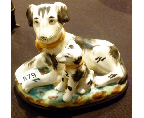 STAFFORDSHIRE CERAMIC. Staffordshire style dog with pup H: 17 cm