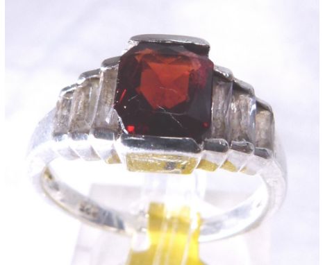 SILVER GARNET RING. Sterling silver emerald cut garnet and CZ ring, size O/P