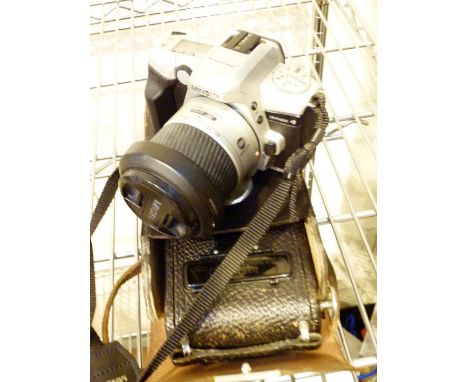 MINOLTA DYNAX 4 CAMERA. Minolta Dynax 4 camera and vintage cased Kodak camera