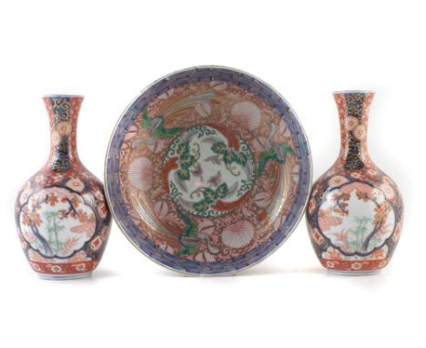 Japanese bowl and a pair vases, finely painted with elaborate Imari patterns, Meiji period (1868-1912) (3) the bowl measures 