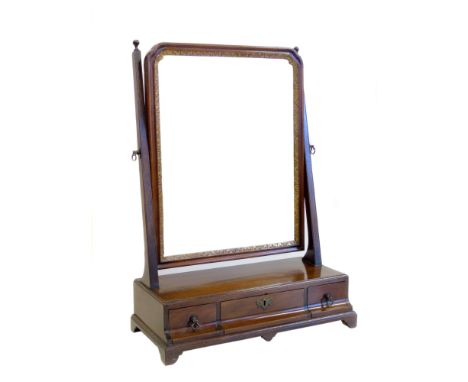 George III mahogany dressing table mirror, the rectangular glass with moulded frame on stick supports, box base fitted three 