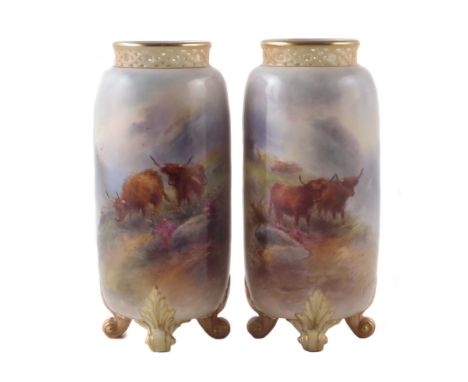 Pair of Royal Worcester vases by Harry Stinton, with pierced necks and raised on scrolling feet, painted with highland cattle