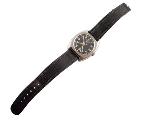 Hamilton 1970's Military wristwatch , round black dial, luminous arabic numerals and batons, tonneau shaped brushed steel cas