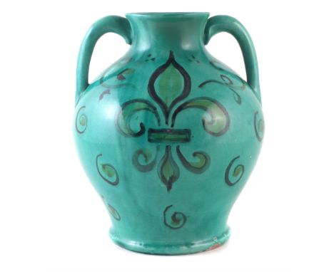 Della Robbia twin handled vase, painted with a fleur-de-lis, incised marks and 999 to base, 30cm high For condition reports g