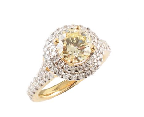 Yellow and white diamond 2-tier cluster ring with diamond set shoulders , the central light yellow diamond weighing approx. 1