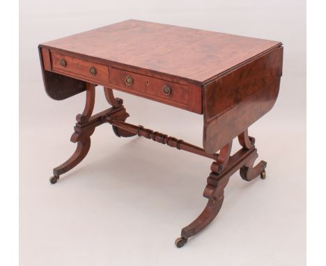 A late-Regency burr wood sofa table for restoration - with two drawers with later brass ring handles, raised on twin scroll s