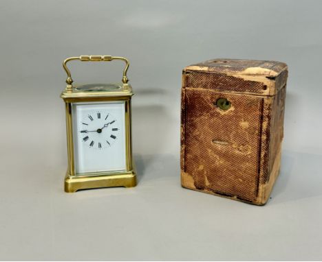 A large size gilt brass carriage timepiece - early 20th century, white enamel Roman dial, single train movement with platform