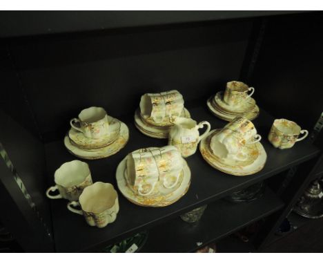 A Victorian fluted gilt and floral tea service