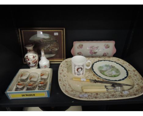 A miscellaneous shelf including Adderley meat platter, drinking glasses etc