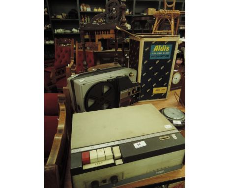 A Philips EL3552 reel to reel recorder, an Aldis colour slide Projector 303, Bell and Howell super 8 projector