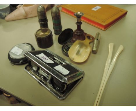 A set of collapsing pocket binoculars, a compass, lightmeter, vintage lighters and folding corkscrew etc