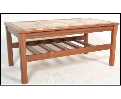 A retro 20th Century Danish inspired tile top teak wood coffee table together with a matching set of three graduating nest of