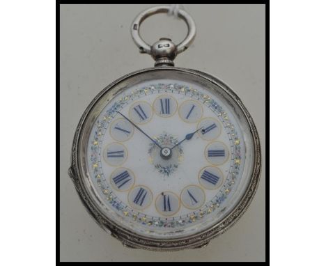 A 19th century Victorian hallmarked silver ladies pocket watch having a white enamel face with blue Roman numeral chapter rin