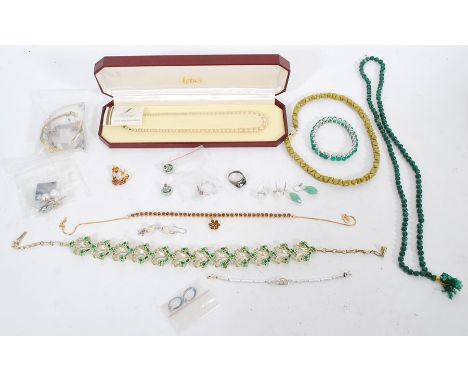 A group of silver and costume jewellery to include rings, green rhinestone floral necklace, boxed pearl necklace, Citizen wat